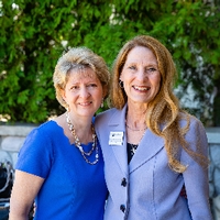 Alumni posing for speech